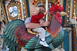 max_and_dad_ride_the_carousel.jpg